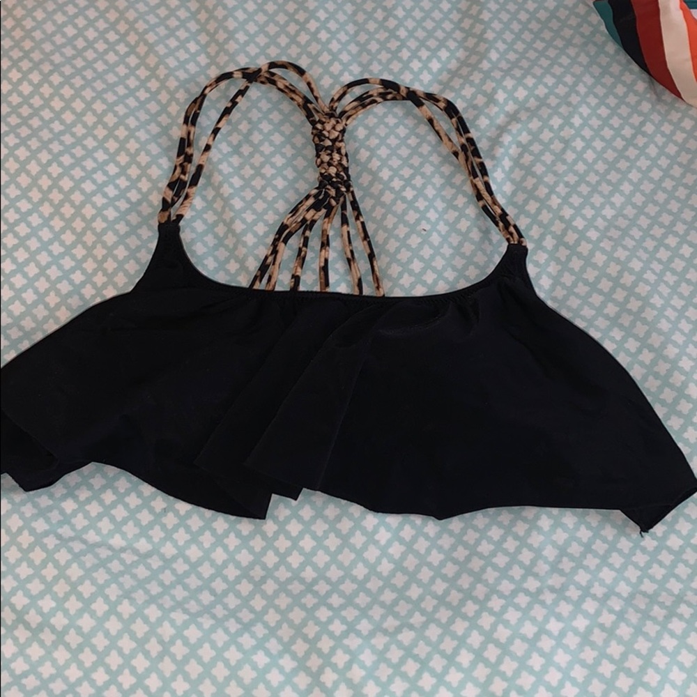 PINK Victoria’s Secret top.